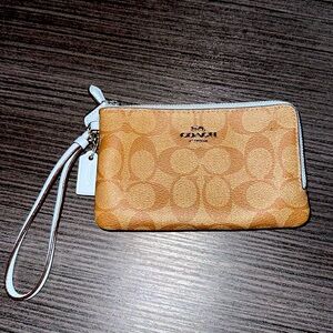 I am selling a double zip wallet coach.